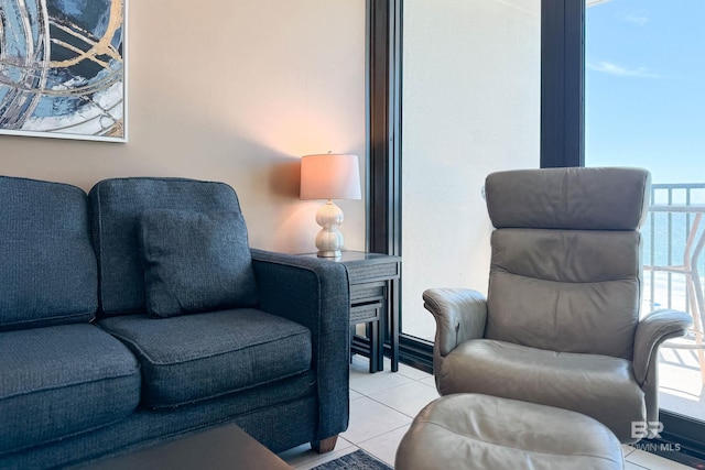 living area featuring light tile patterned floors