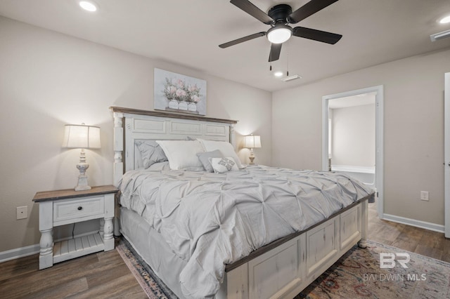 bedroom with ceiling fan and dark hardwood / wood-style flooring