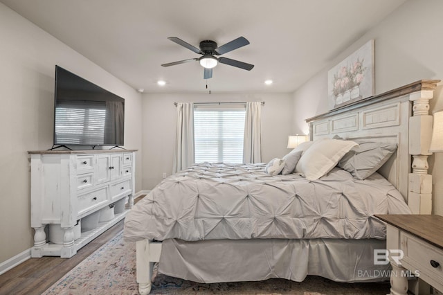 bedroom featuring ceiling fan and dark wood-type flooring