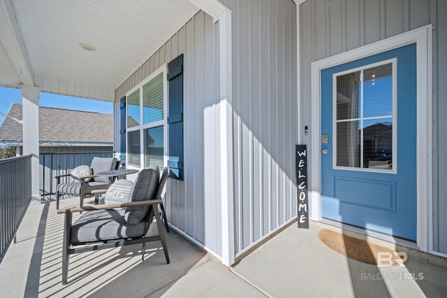 doorway to property featuring a porch