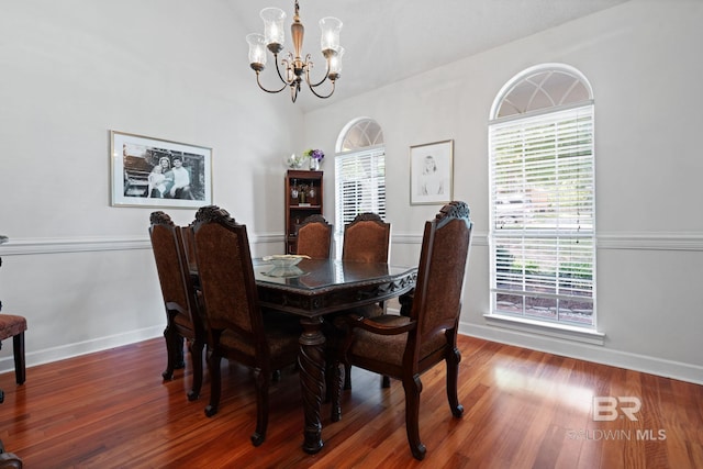 6417 Magnolia Place Ct, Mobile, AL 36695 - dining area featuring a chandelier, baseboards, and wood finished floors