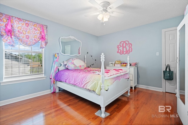 6417 Magnolia Place Ct, Mobile, AL 36695 - bedroom featuring wood finished floors, baseboards, and ceiling fan