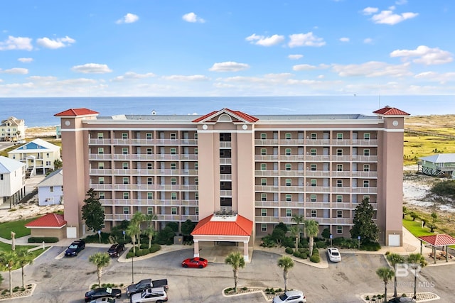 view of building exterior with a water view