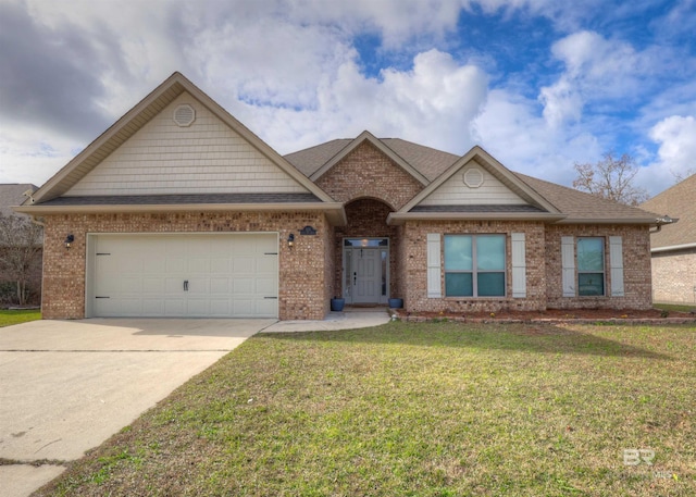 view of front of house with a garage and a front lawn