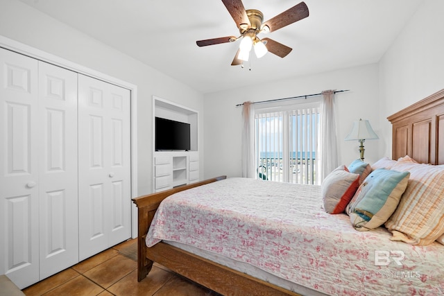 bedroom with access to exterior, ceiling fan, and tile patterned flooring