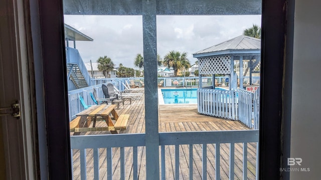 view of pool featuring a deck