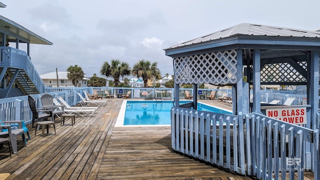 view of swimming pool with a gazebo