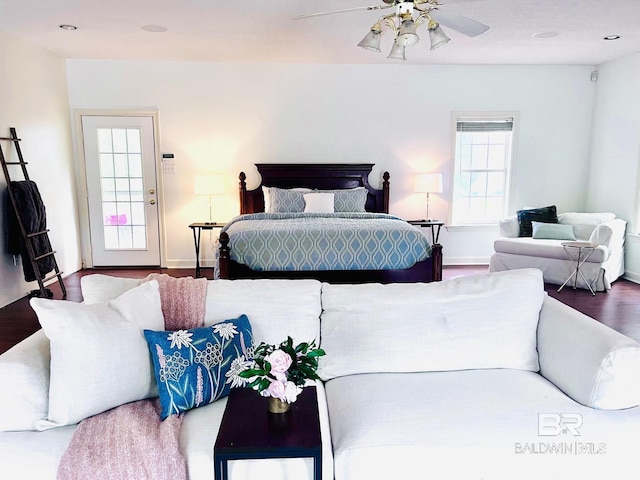 bedroom featuring hardwood / wood-style floors and ceiling fan