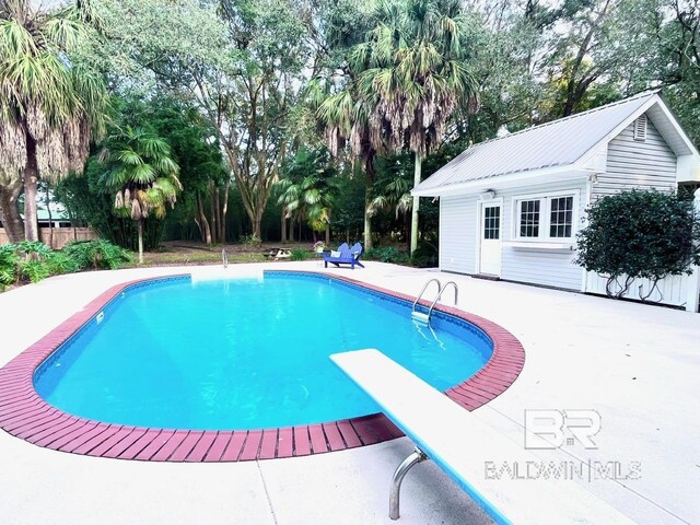19744 County Road 9, Silverhill, AL 36576 - view of swimming pool with a patio area and an outdoor structure