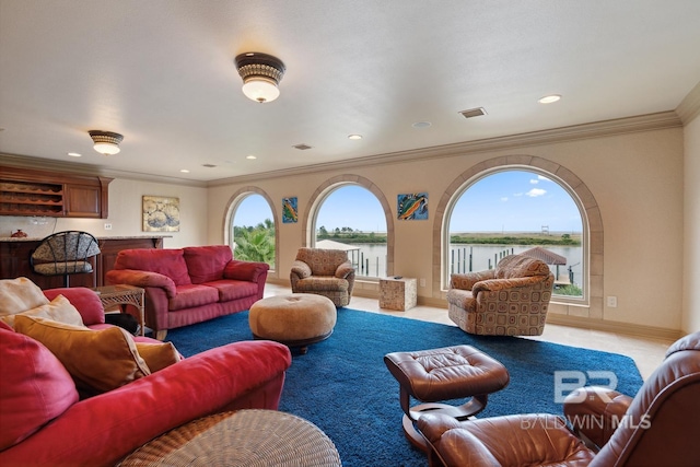 28452 Ono Blvd, Orange Beach, AL 36561 - living area with a water view, crown molding, and recessed lighting