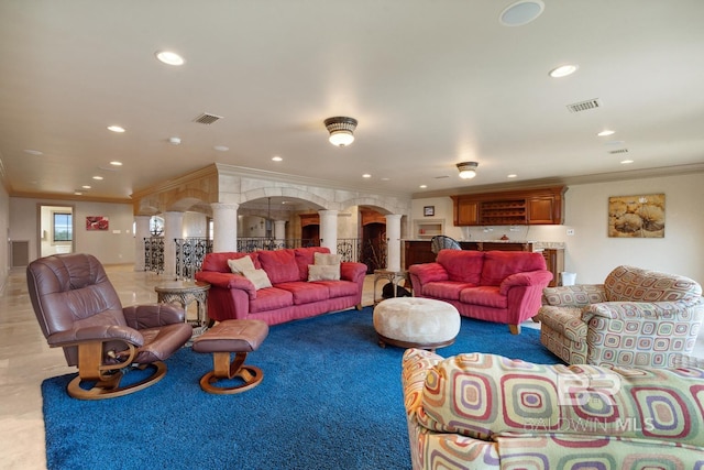 28452 Ono Blvd, Orange Beach, AL 36561 - living room with ornate columns, ornamental molding, recessed lighting, and carpet floors