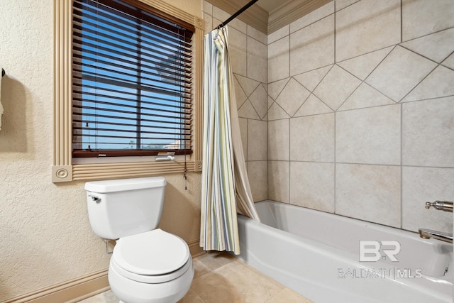 28452 Ono Blvd, Orange Beach, AL 36561 - full bathroom featuring a textured wall, shower / bath combo with shower curtain, tile patterned flooring, and crown molding