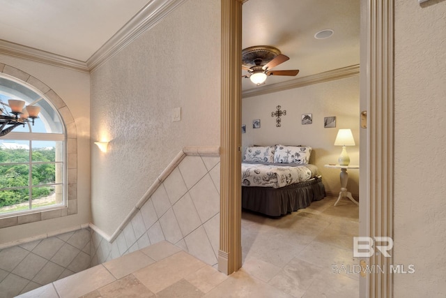 28452 Ono Blvd, Orange Beach, AL 36561 - bedroom with a textured wall, ornamental molding, light tile patterned flooring, and ceiling fan