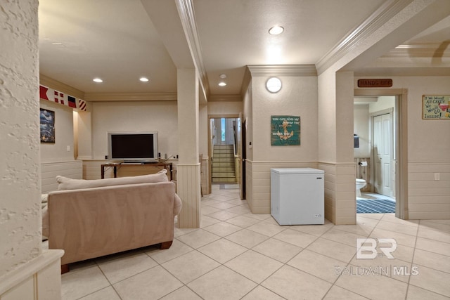 28452 Ono Blvd, Orange Beach, AL 36561 - living room with crown molding, wainscoting, recessed lighting, and light tile patterned floors