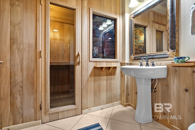 28452 Ono Blvd, Orange Beach, AL 36561 - bathroom with tile patterned floors and wooden walls