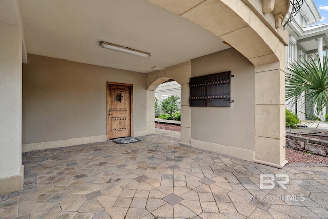 28452 Ono Blvd, Orange Beach, AL 36561 - view of exterior entry with stucco siding