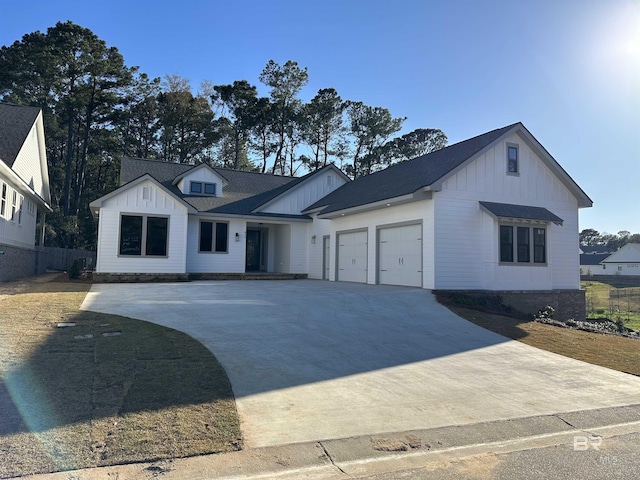 modern farmhouse with a garage