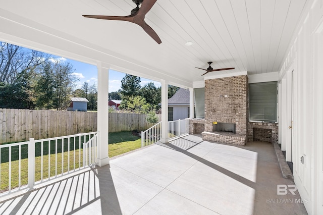 view of patio featuring ceiling fan