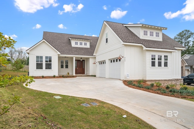 modern farmhouse with a front lawn