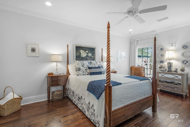 bedroom featuring baseboards, visible vents, crown molding, and wood-type flooring