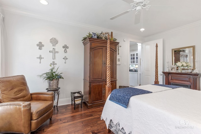 bedroom featuring dark wood-type flooring, ornamental molding, and baseboards