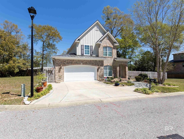 view of front facade featuring a standing seam roof, fence, metal roof, board and batten siding, and driveway