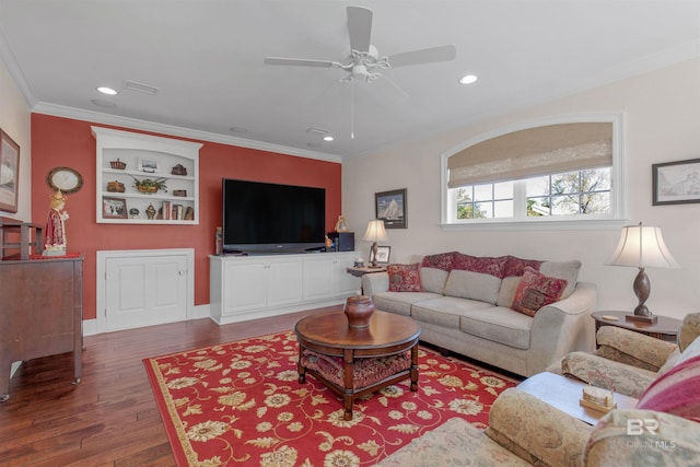 living area with crown molding, recessed lighting, visible vents, a ceiling fan, and wood finished floors