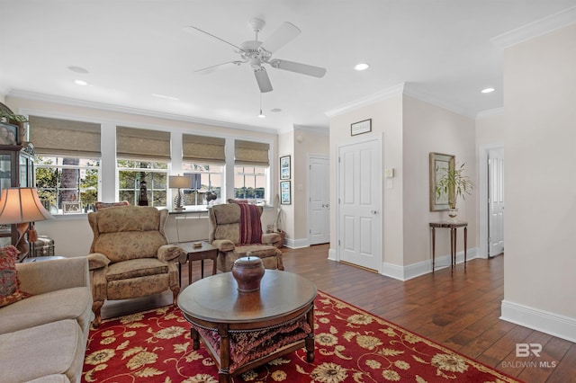 living area with plenty of natural light, ornamental molding, baseboards, and dark wood finished floors