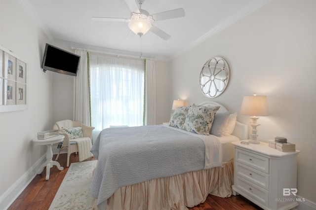 bedroom featuring baseboards, ornamental molding, a ceiling fan, and dark wood finished floors