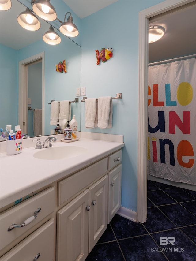 bathroom featuring vanity and tile patterned floors