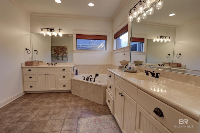 bathroom with a sink, a garden tub, two vanities, and ornamental molding