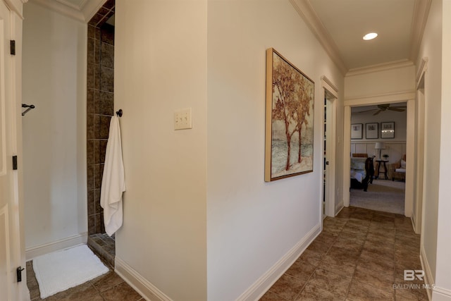 hall with recessed lighting, baseboards, crown molding, and tile patterned flooring