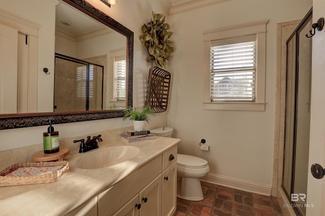 bathroom with baseboards, plenty of natural light, a stall shower, and crown molding