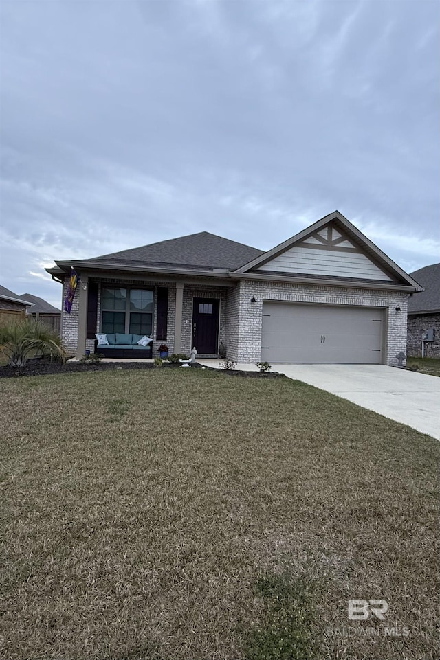 ranch-style home with brick siding, a shingled roof, an attached garage, a front yard, and driveway