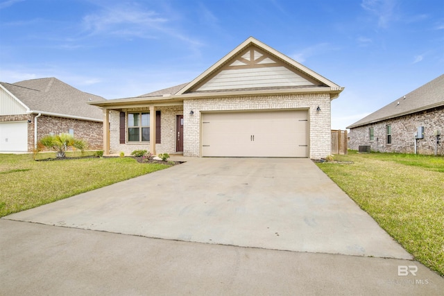 view of front facade featuring a front yard, brick siding, and an attached garage