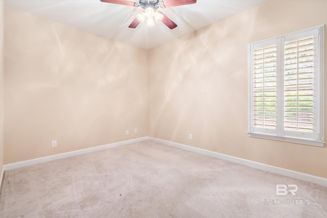 unfurnished room with light carpet and ceiling fan