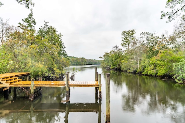 view of dock with a water view