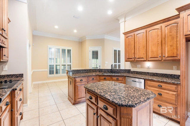 kitchen with ornamental molding, dishwasher, sink, and a kitchen island