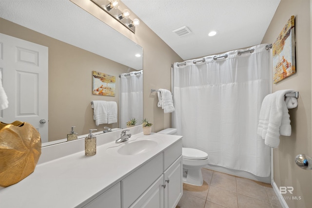 375 Beach Club Trl Unit B404, Gulf Shores, AL 36542 - bathroom featuring vanity, toilet, tile patterned floors, and a shower with curtain