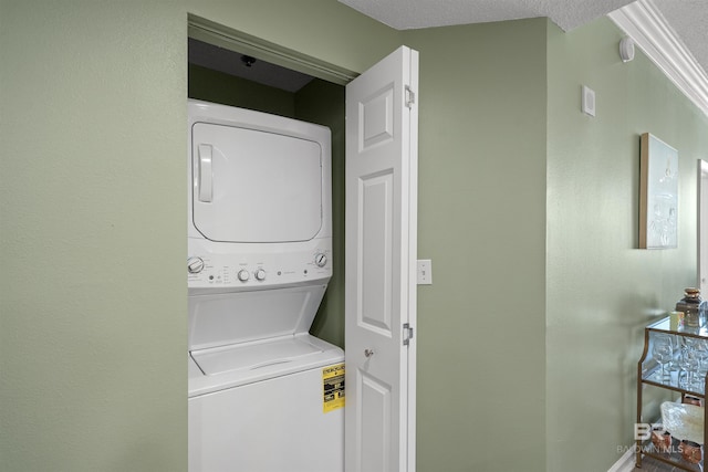 375 Beach Club Trl Unit B404, Gulf Shores, AL 36542 - laundry area with stacked washer / dryer