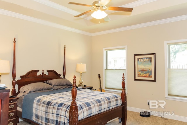 bedroom featuring multiple windows, carpet, crown molding, and ceiling fan