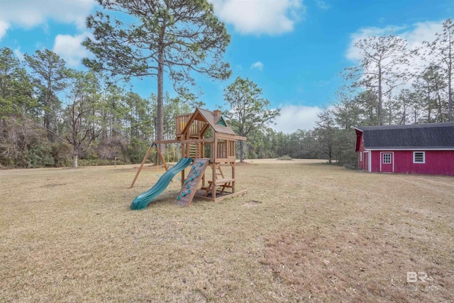 view of playground with a yard