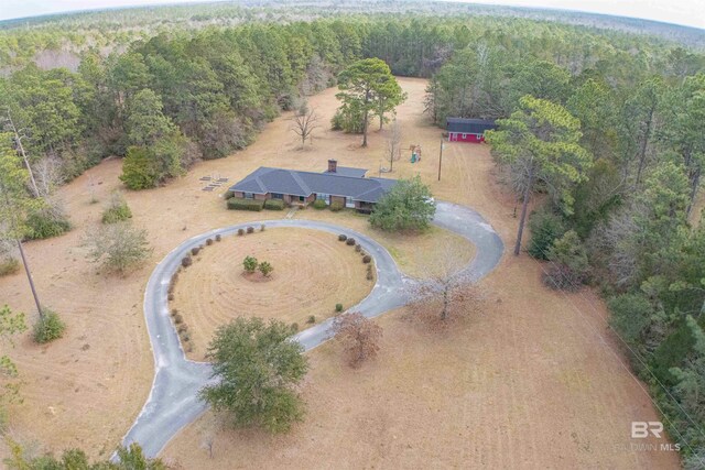 aerial view with a rural view and a view of trees