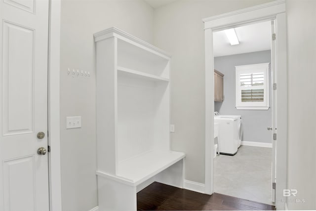 mudroom with washing machine and dryer