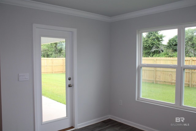 entryway featuring a healthy amount of sunlight, baseboards, ornamental molding, and dark wood-style flooring