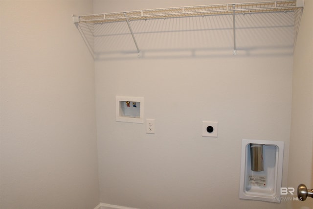 washroom with laundry area, washer hookup, electric dryer hookup, and baseboards