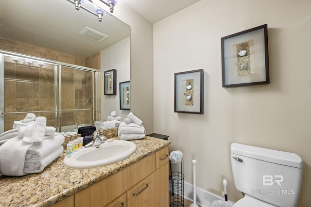 bathroom with oversized vanity and toilet