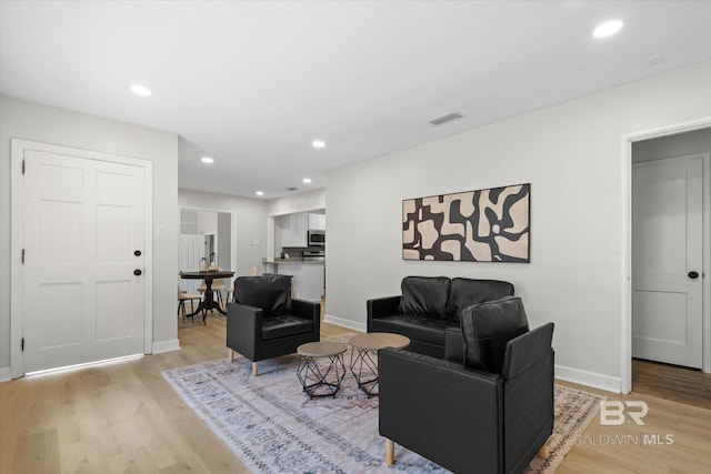 3512 Spring Hill Ave, Mobile, AL 36608 - living area featuring light wood finished floors and recessed lighting