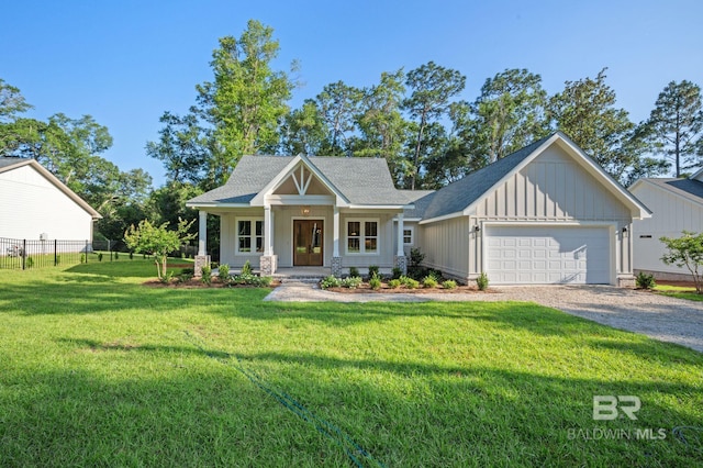 12380 Mannich Ln, Foley, AL 36580 - craftsman inspired home with board and batten siding, a porch, a shingled roof, and gravel driveway