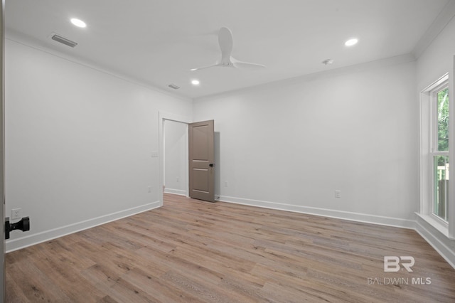 12380 Mannich Ln, Foley, AL 36580 - empty room with light wood-style flooring, a ceiling fan, recessed lighting, baseboards, and crown molding